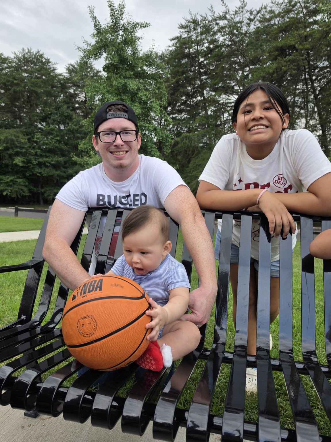 The M&E Moving Services family together at a park